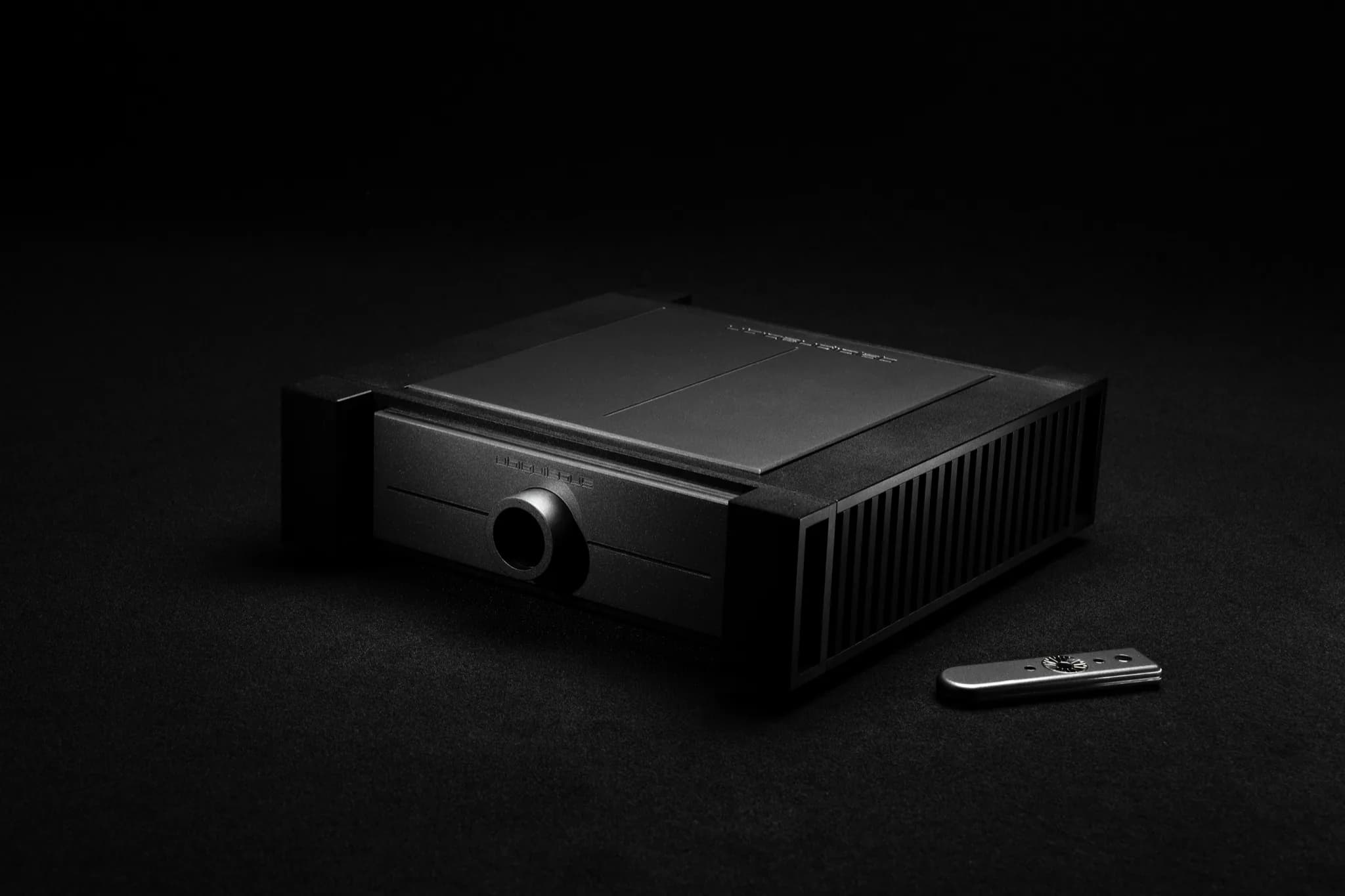 Black UBIQUITOUS 300B hybrid preamplifier with a central volume control
