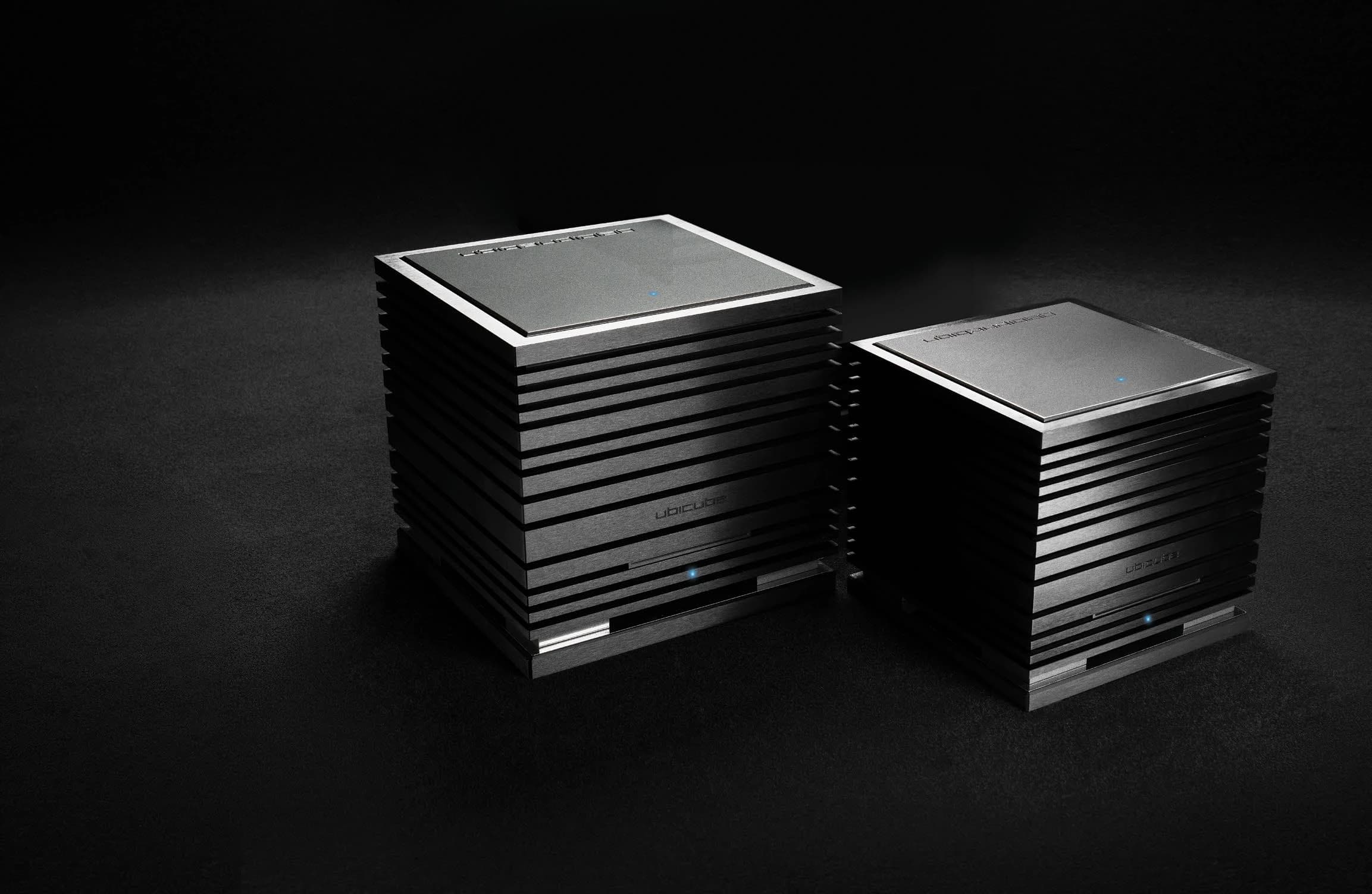 The UBICUBE 400 and the smaller UBICUBE 200 side by side on a dark ground